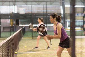 women padel players on court during lesson